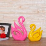 Lucky Swan Couple Showpiece for Home Decor (Pink & Yellow) Polyresin – 10 Inch