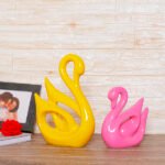 Lucky Swan Couple Showpiece for Home Decor (Yellow & Pink) Polyresin – 10 Inch